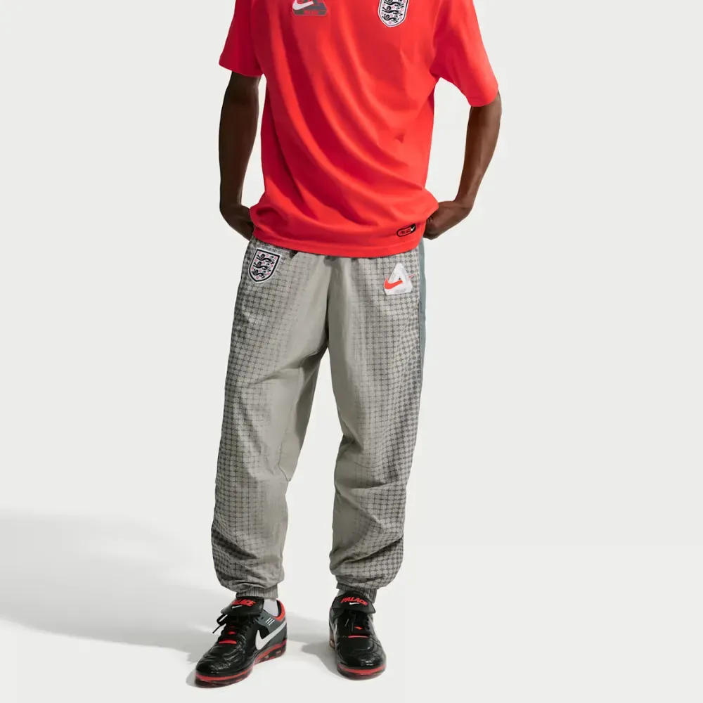 England x Palace x Nike Calça Solo Swoosh Track Pewter Grey - Droper