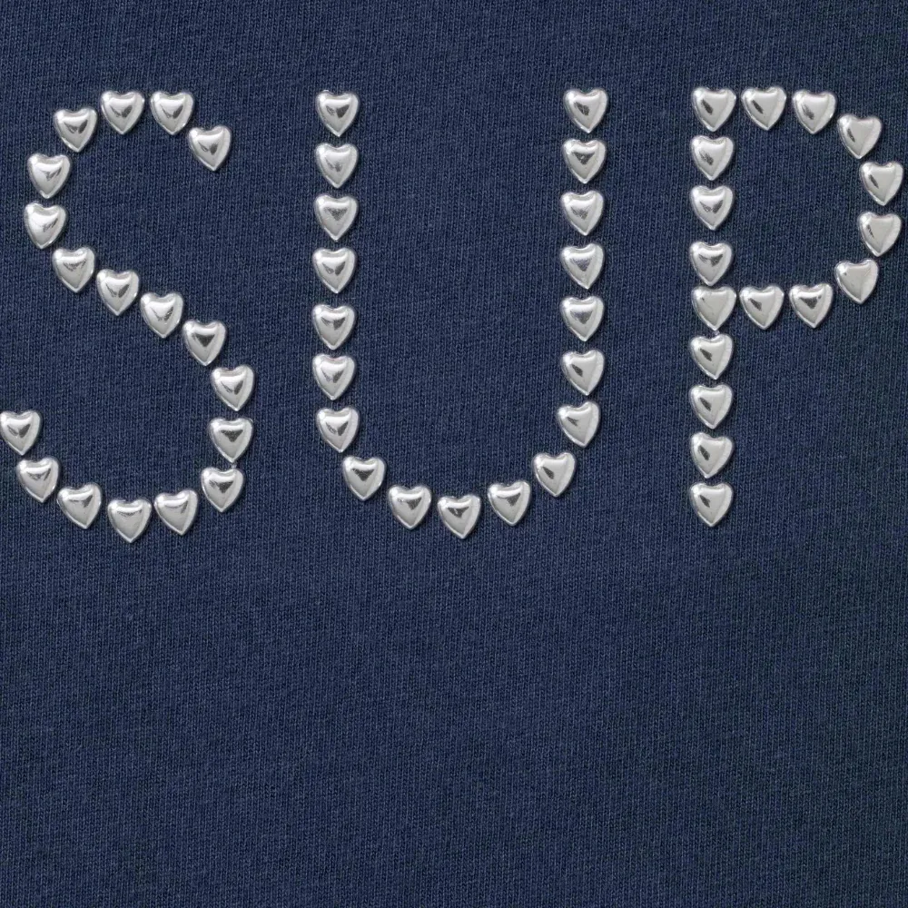 Camiseta Supreme Hearts Studded S/S Top Navy FW26-W5 foto 1