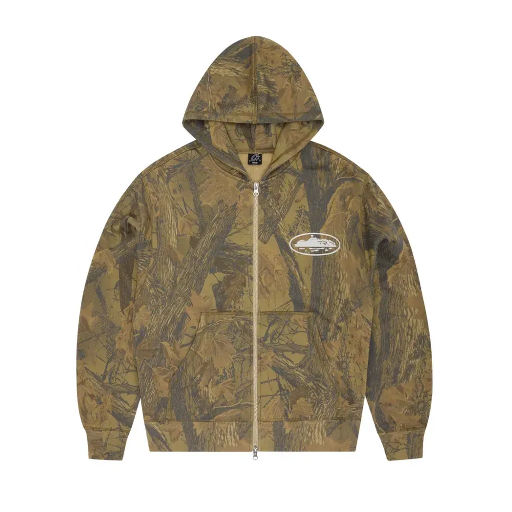 Conjunto Corteiz Island Puff Print Zip Forest Camo foto 1