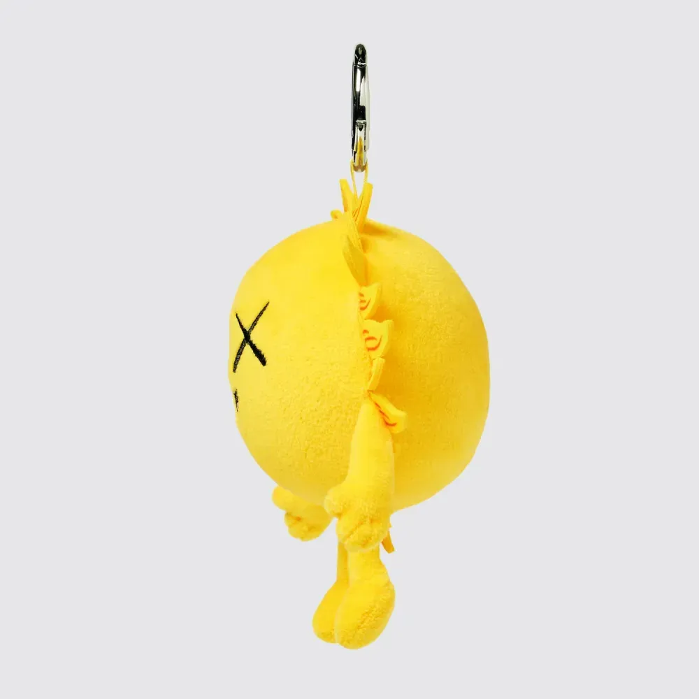 KAWS x Uniqlo Chaveiro Universe Charm Sun Yellow foto 1