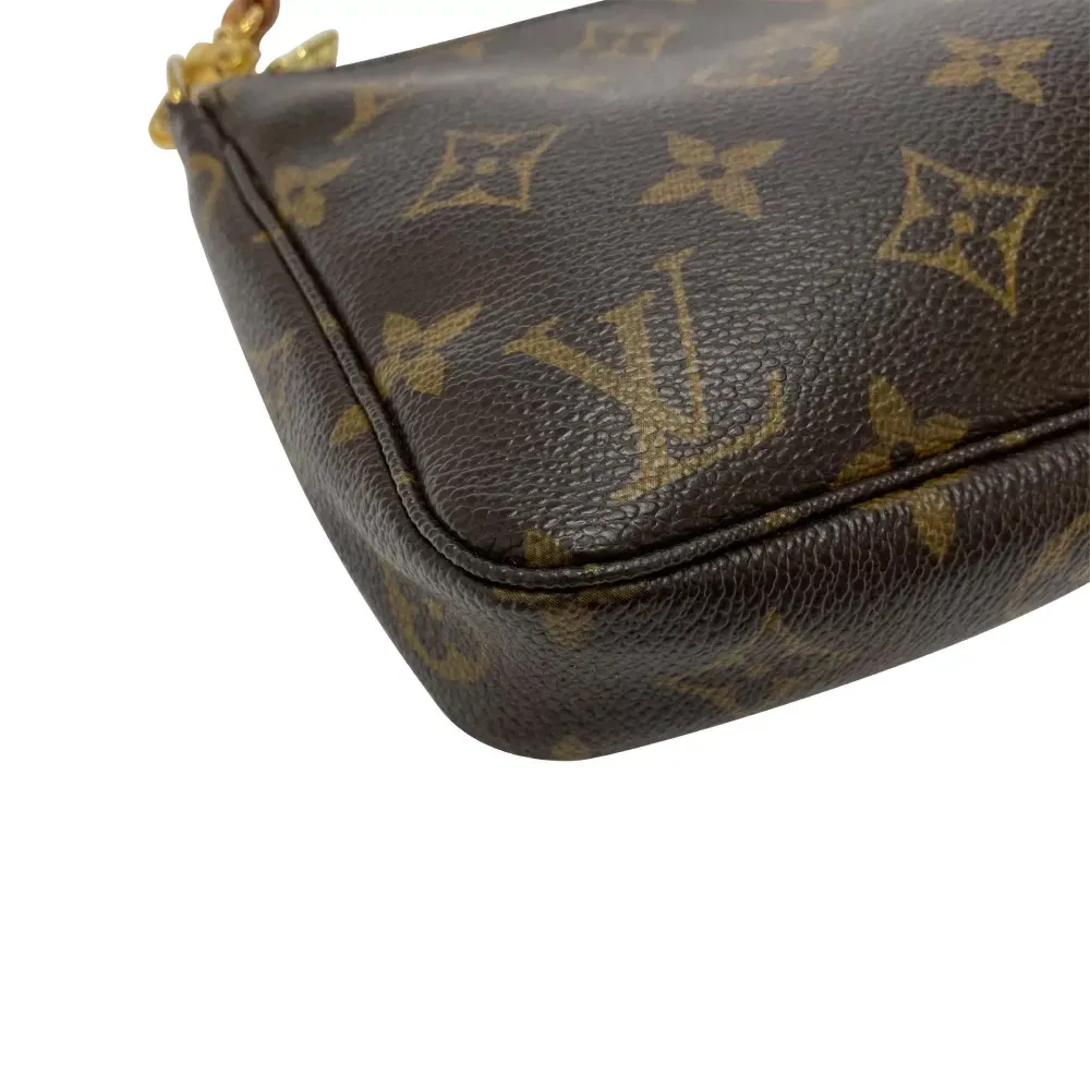 Bolsa Louis Vuitton Pochette Accessoires Monogram Brown foto 3