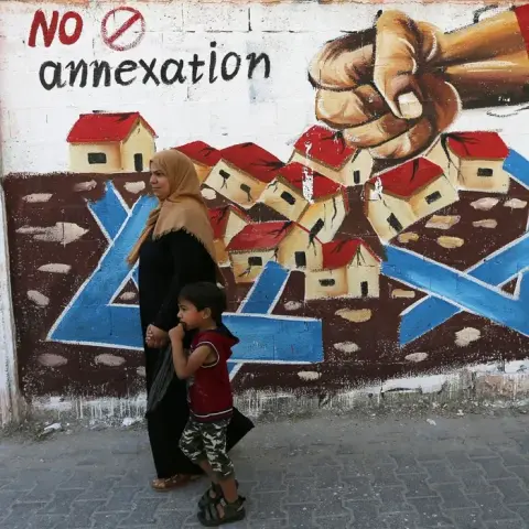 Un murales palestinese contro l'annessione.